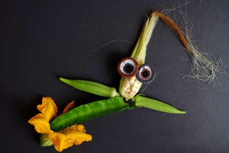 Funny face set up from food, agriculture product from rooftop garden, small corn, pumpkin flower,...