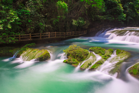 Guizhou Libo Xiaoqikong (Seven Small Arches) Scenic Area, 68-layer waterfallの写真素材