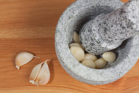 China's traditional stone pound garlicの写真素材