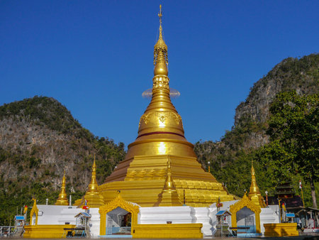 Golden pagoda in Wat Sao Roi Ton, Myanmarの写真素材