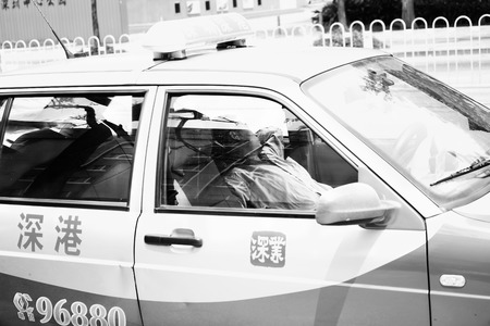 taxi driver taking a rest in his taxiのeditorial素材