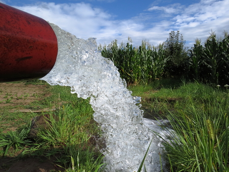 Farmers in the north of China, in the summer of the northern country, are pumping water to irrigation fieldsの写真素材