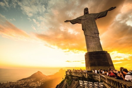 RIO DE JANEIRO, MARCH 3, 2013: Tourists are happy to see the first sunset after a week of rain and thunderstorms on the Corcovado Hill - march 3, 2013 in Rio de Janeiro, Brazil. In 2007 was elected one of the new seven wonders of the world.のeditorial素材