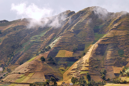 Clouds on the fields of Zumbahua in Ecuadorian Altiplano  Highland Andes near Quilotoa lagoon, South Americaの写真素材