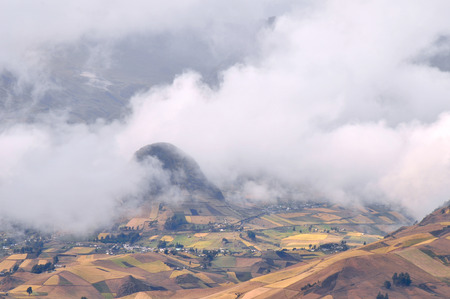 Clouds on the fields of Zumbahua in Ecuadorian Altiplano  Highland Andes near Quilotoa lagoon, South Americaの写真素材