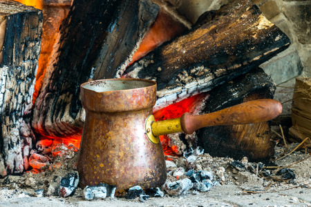 Turkish coffee is ideally cooked over some hot coals that have burned for a long time and settled into ashesの写真素材