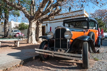 COLONIA, JULY 29: Vintage cars participate in the street exhibition in Historic neighborhood in Colonia,  July 29, 2011 in Colonia del Sacramento, Uruguayのeditorial素材