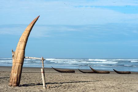 Traditional Peruvian small Reed Boats (Caballitos de Totora), straw boats still used by local fishermens in Peruの写真素材
