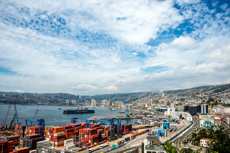 VALPARAISO CHILE - OCT 20: Houses of historical shell and Cranes in a port of Valparaiso, on October 20 2015 in Valparaiso, Chileのeditorial素材
