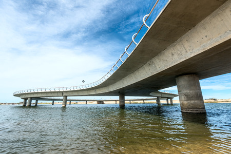 Jose Ignacio, Uruguay, March 08, 2016 - A new bridge on a Uruguayan lagoon Garzon affording...