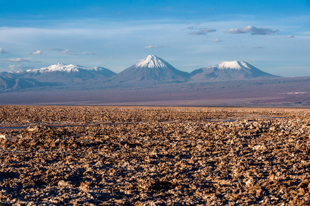 Volcanoes Licancabur and Juriques of Cordillera de la Sal, west of San Pedro de Atacama, Atacama desert of Chileの写真素材