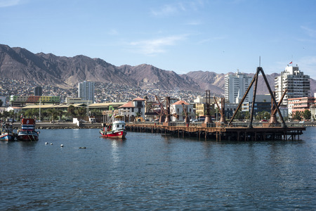 Antofagasta, Chile - April 5, 2015: Colourful wooden fishing boats in the harbour at Antofagasta in the Atacama Region of Chileのeditorial素材