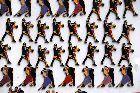 Buenos Aires, Argentina - July 9, 2011: Refrigerator magnets with the image of tango dancers are sold during the tango-feast on the streetのeditorial素材