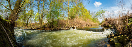 Landscape in spring with river and treesの写真素材