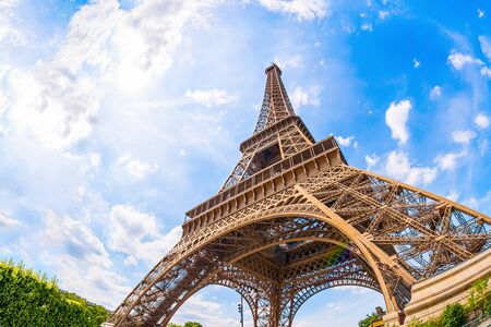The Eiffel Tower in Paris on a beautiful summer day with blue skies in the backgroundの写真素材