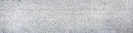 Panorama of an old gray concrete wall