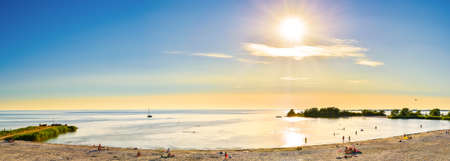 The IJsselmeer in the Netherlands with the beach of Makkumの写真素材