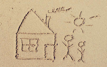 Drawing in the sand on the beachの写真素材