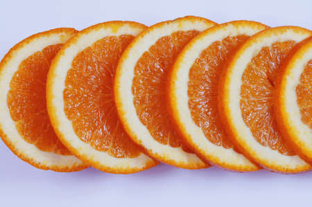 Orange slices on white backgroundの写真素材
