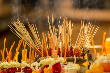 Incense sticks in buddhist templeの写真素材