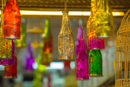 Beautiful colorful bottle hanging on the roof.の写真素材