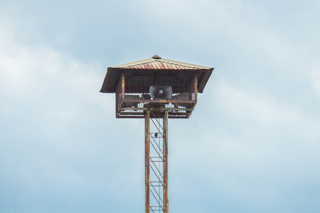Speaker or loudspeaker or megaphone with sky and cloud on the background.の写真素材