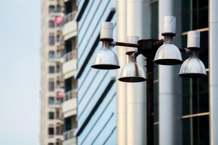 Street Lamp with building on the background.の写真素材
