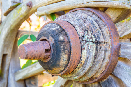 Center of old wooden cart wheel.の写真素材