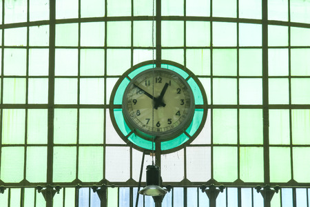 Old retro clock at train stationの写真素材