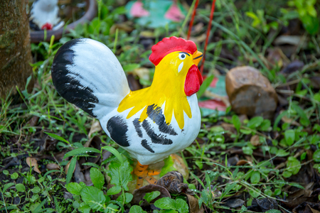 Chicken statue in the home garden.の写真素材
