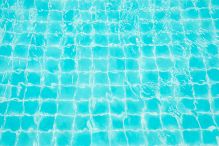 Abstract image surface of blue swimming pool water for background textured usage.