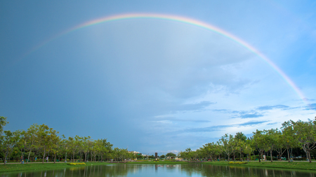 Bangkok, Thailand. - September 2, 2017 : Rainbow on blue sky after raining at public park named Suan Luang Rama IX at sunset Bangkok, Thailand.のeditorial素材