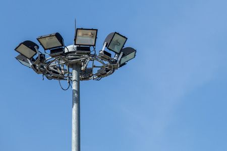 Lighting or Spotlight Tower of stadium on sky and cloud background with copy space.