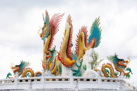 Nakornsawan, Thailand. - October 8, 2017 : Beautiful giant or big colorful dragon statue with blue sky at Nakornsawan Park, Thailand.のeditorial素材