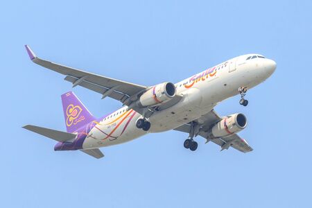 Bangkok, Thailand. - April 22, 2017 : Plane or Aircraft of Thai Smile Airways or Airlines on the sky landing to Suvarnabhumi airport.のeditorial素材