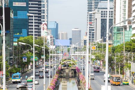 Bangkok, Thailand. - May 21, 2016 : Traffic at road in the city center. near interchange skywalk to transit between Sky Transit (BTS) and Bus Rapid Transit (BRT) at Chong Nonsi, Bangkok, Thailand.のeditorial素材
