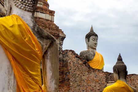 Buddha statues at Wat Yai Chaimongkol, Ayutthaya, Thailand.の写真素材