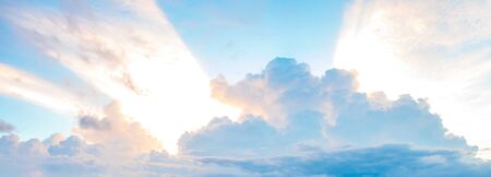 Panorama or panoramic dramatic blue sky and clouds at sunset or evening time.の写真素材