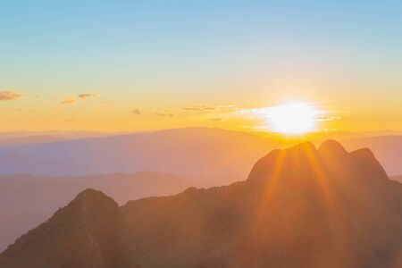 Sunset or evening time with blue sky and sunray or sunbeam at Doi Luang Chiang Dao, Chaingmai, Thailand.の写真素材