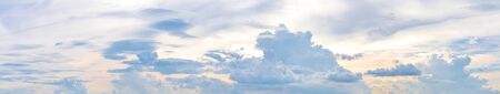 Panorama or panoramic photo of Dramatic blue sky and clouds at sunset or evening time.