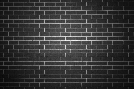 Old brick wall with vignetting of dark or black blur border gradient in bw or black and white tone for backdrop or background.の写真素材