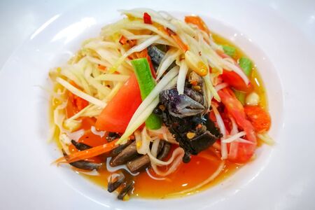 Closeup to Famous Thai food, papaya salad or SOM TAM or Somtum.