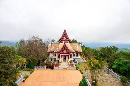 Chiang Rai, Thailand - December 14 2018 : Behind of back of Sinakarintra Stit Mahasantikhiri Pagoda at Chiang Rai, Thailand.のeditorial素材