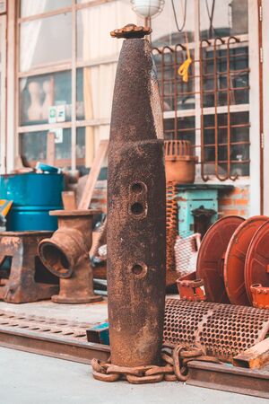 Old broken rusty torpedo of submarine.の写真素材