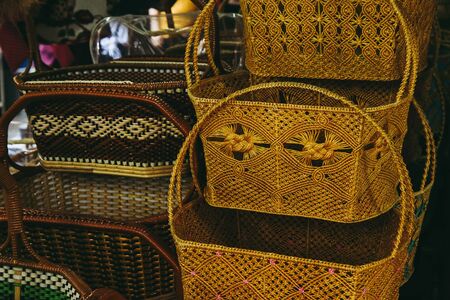 Vintage handmade or handcrafted of bamboo basket for sell as souvenir at vintage float market.