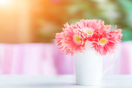 Coffee shop table flower decorationsの写真素材
