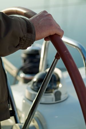 sailor taking care of the rudder