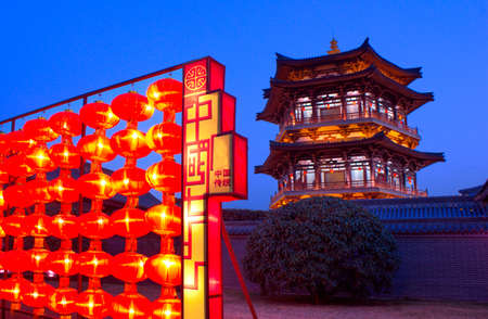 Night view of the ancient Chinese temple with lanterns at night.