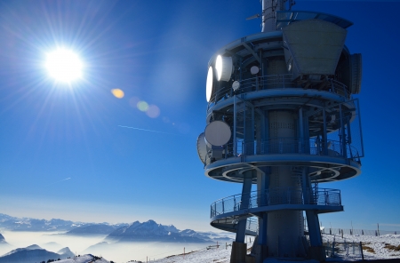 Top of mountain Rigi Alp in Switzerland, Europe, in the sunlight at noon in winter with blue sky の写真素材