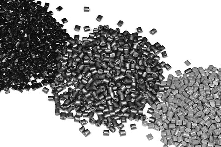three little heaps of synthetic material in laboratory